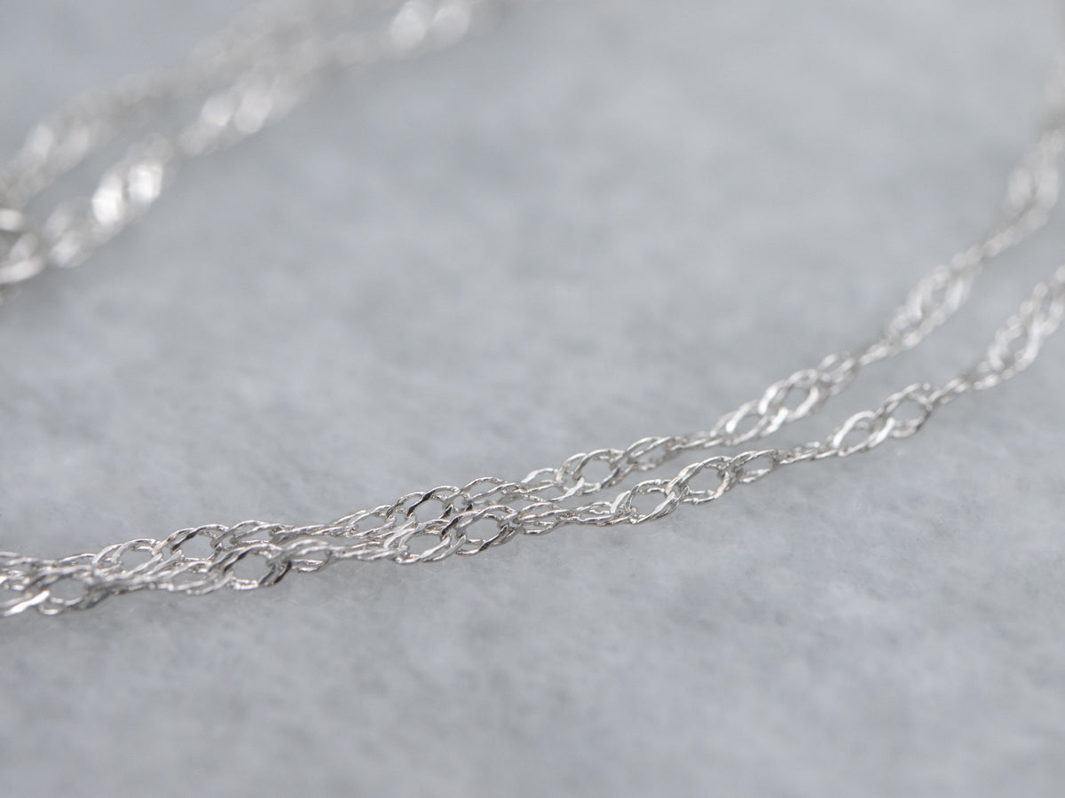 Modern Sapphire and Diamond Halo Floral Pendant Necklace