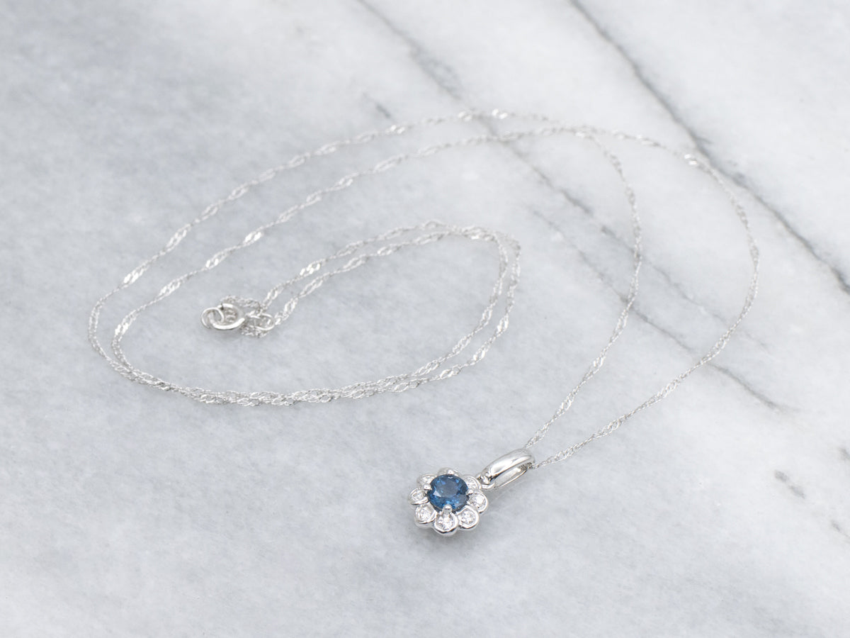 Modern Sapphire and Diamond Halo Floral Pendant Necklace