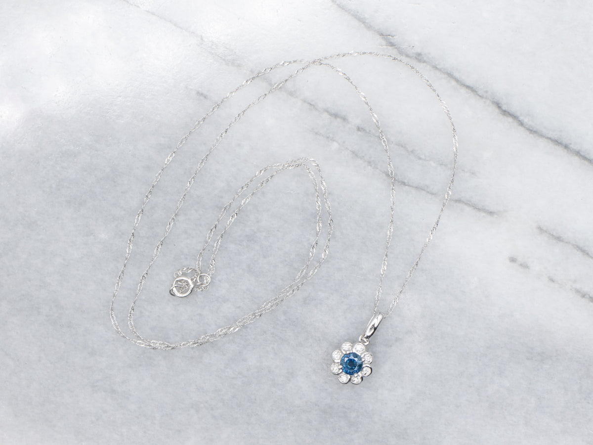 Modern Sapphire and Diamond Halo Floral Pendant Necklace