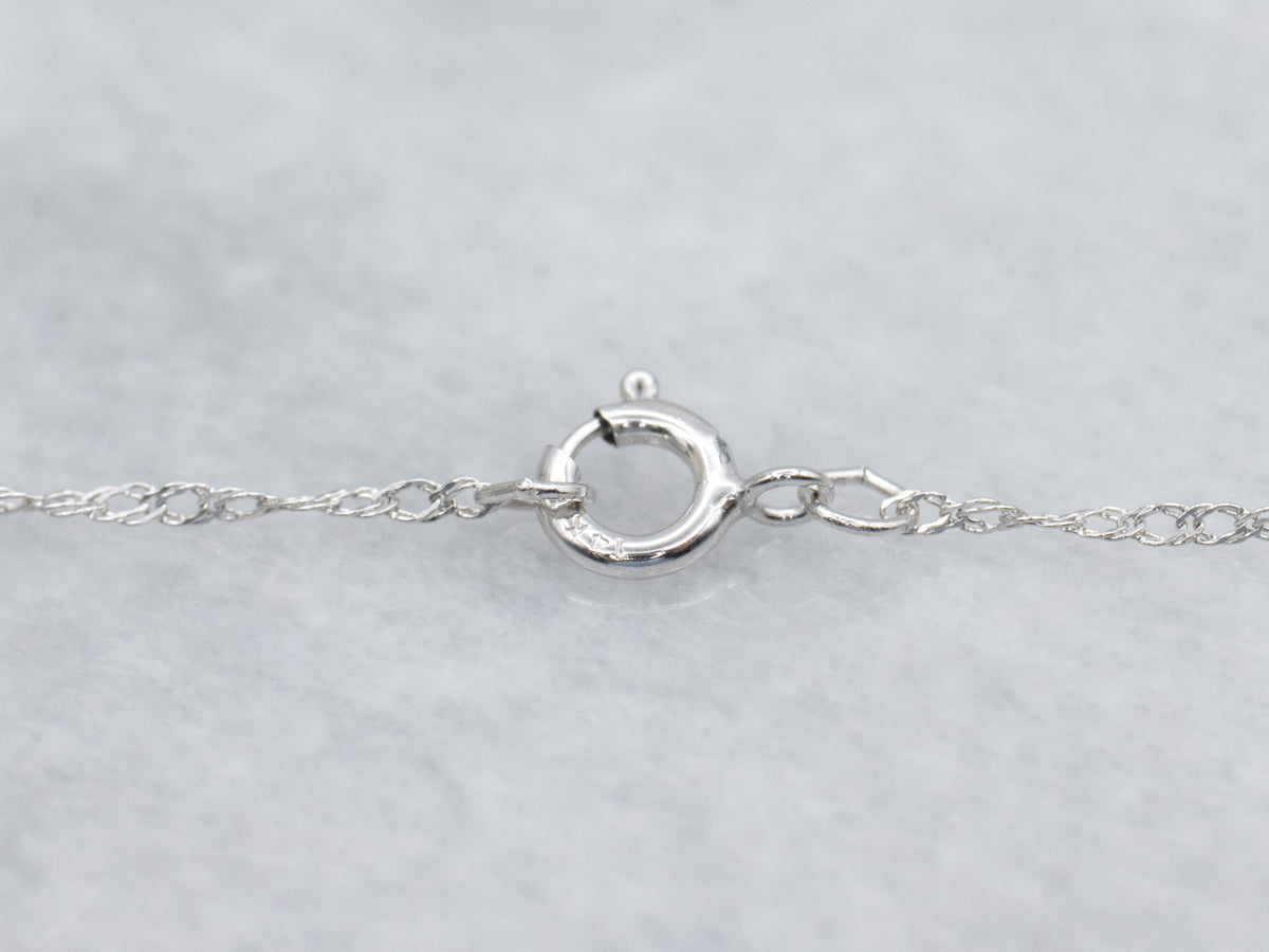 Modern Sapphire and Diamond Halo Floral Pendant Necklace