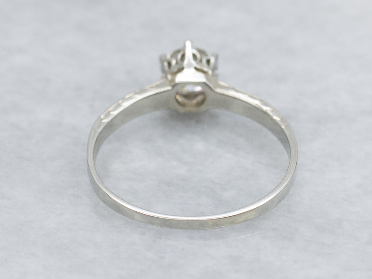 Antique Ostby and Barton Solitaire Engagement Ring with Round Brilliant Diamond
