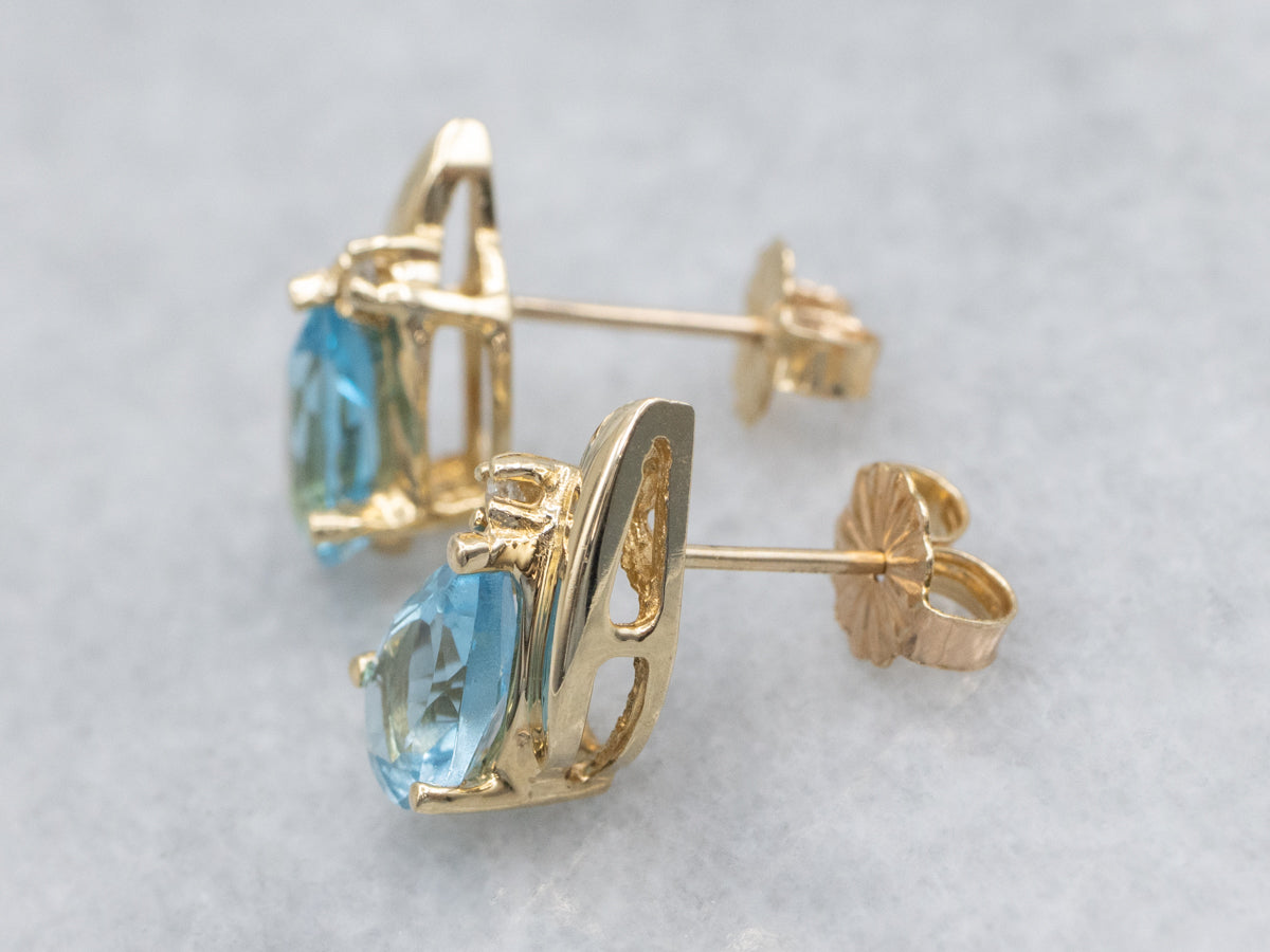 Blue Topaz and Diamond Yellow Gold Stud Earrings