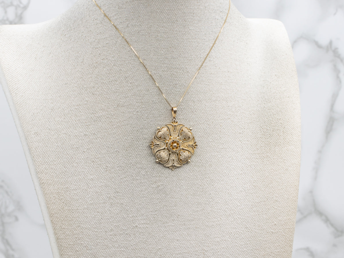 Ornate Floral Yellow Gold Textured Round Pendant with Rope Twist Accent