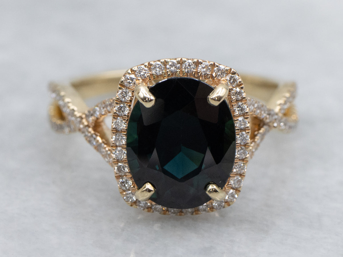 Modern Yellow Gold Sapphire and Diamond Halo Ring
