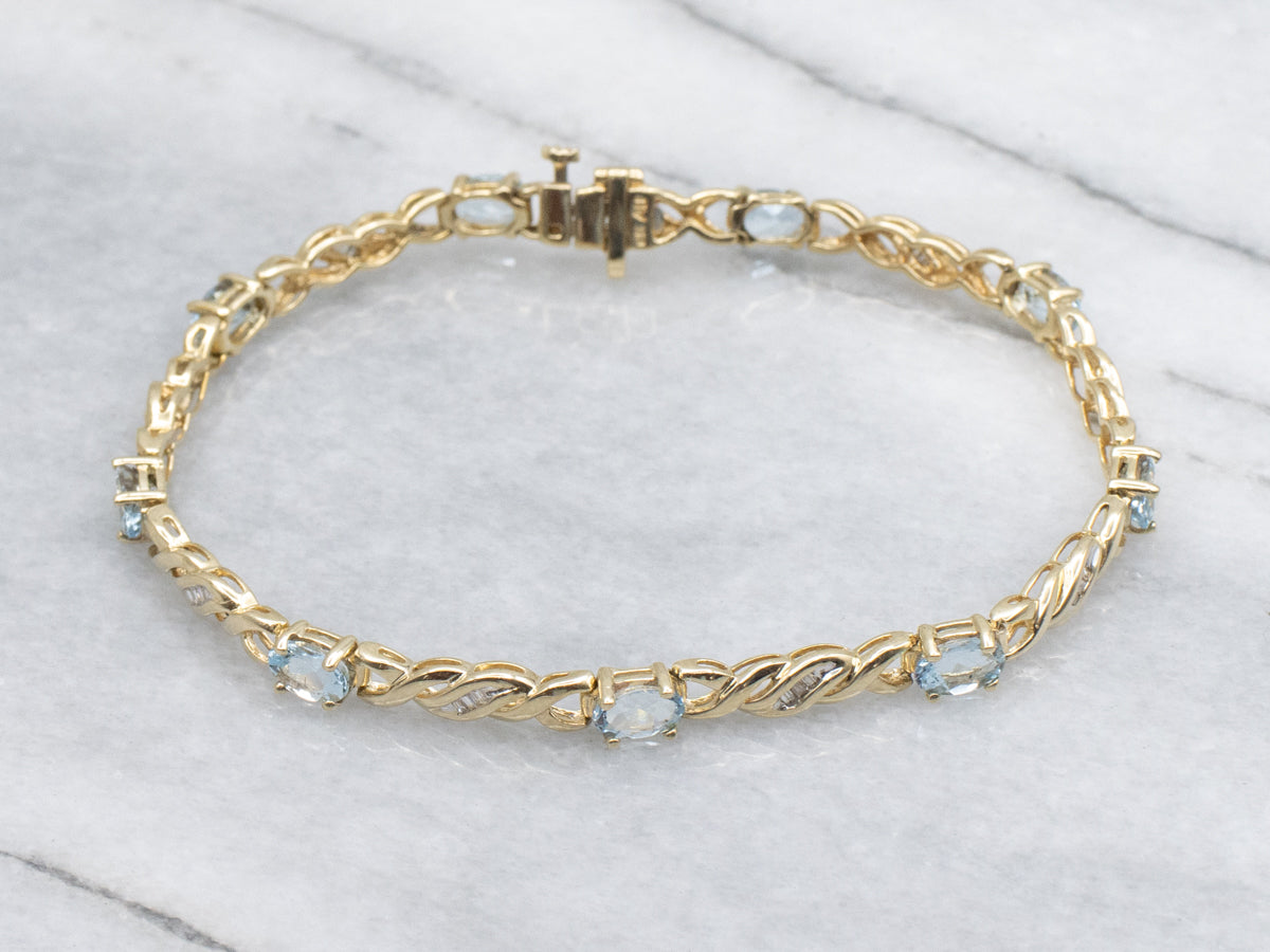 Twisting Gold Aquamarine and Diamond Link Bracelet