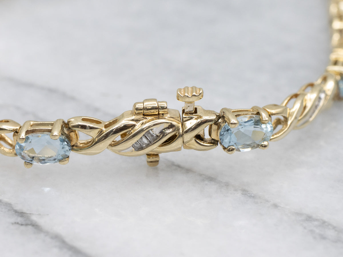 Twisting Gold Aquamarine and Diamond Link Bracelet