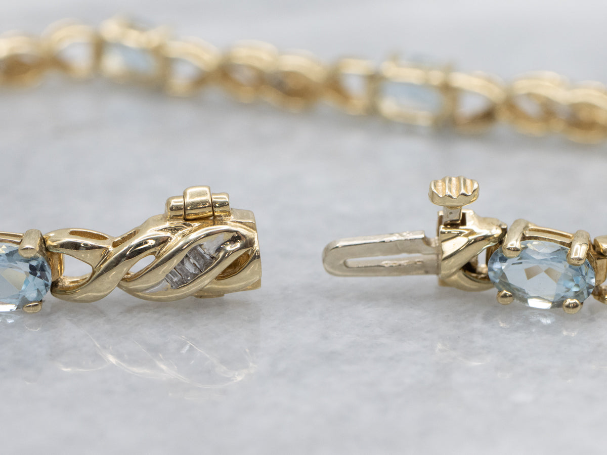 Twisting Gold Aquamarine and Diamond Link Bracelet