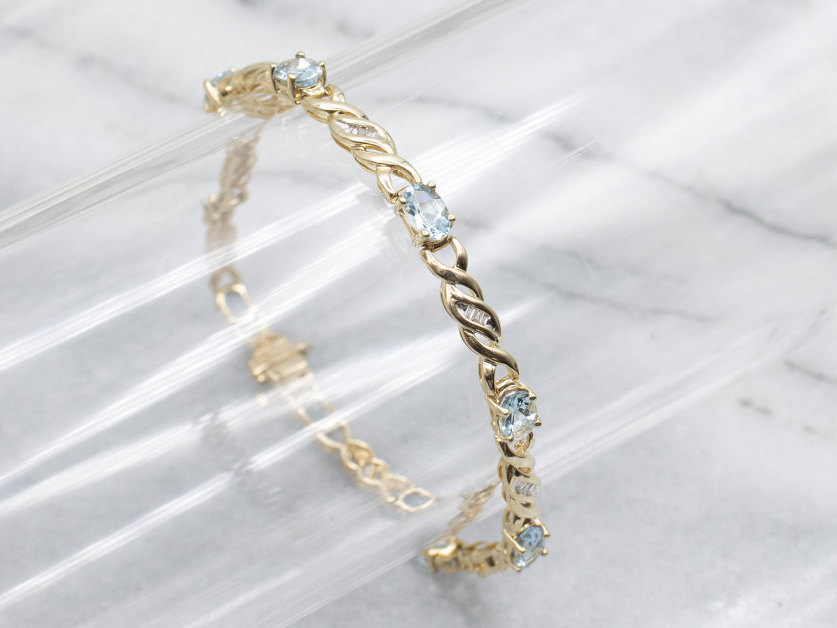 Twisting Gold Aquamarine and Diamond Link Bracelet