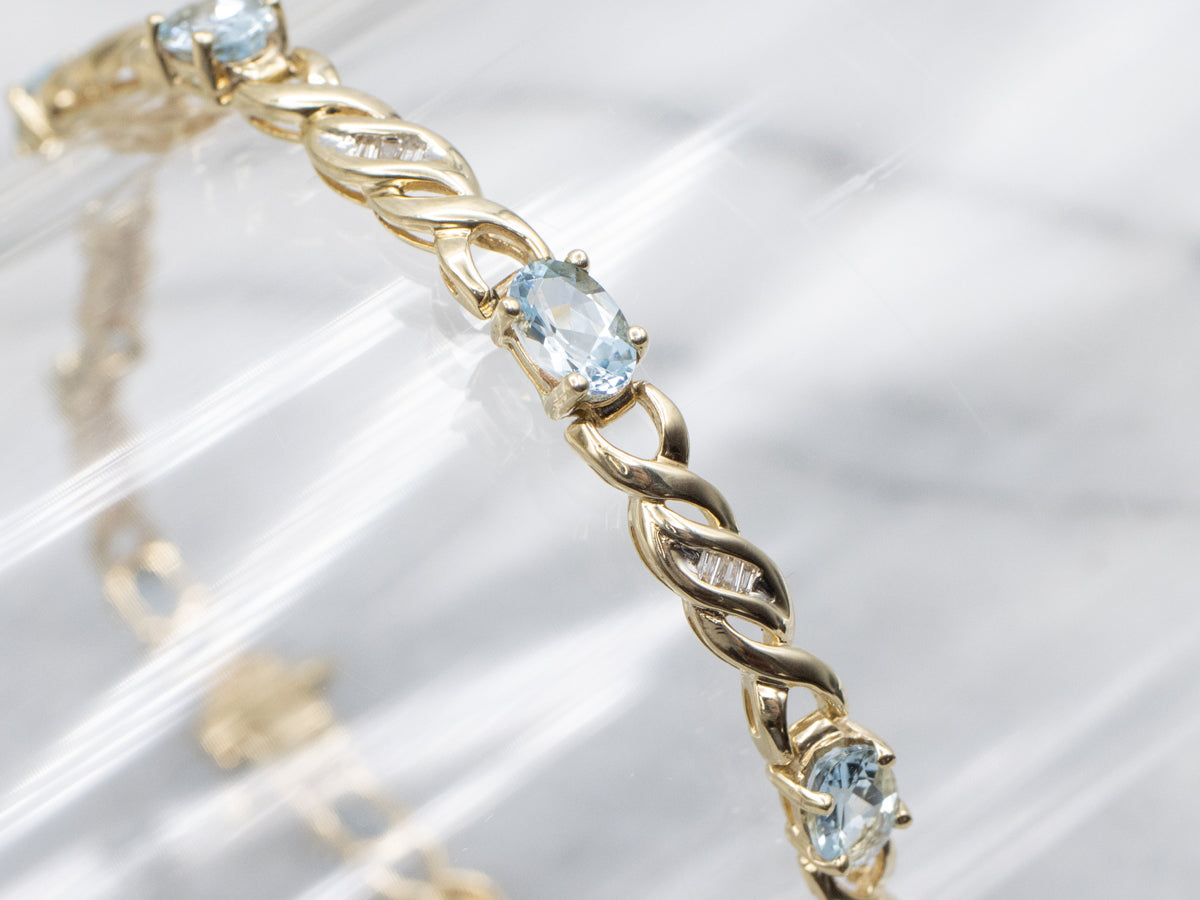 Twisting Gold Aquamarine and Diamond Link Bracelet
