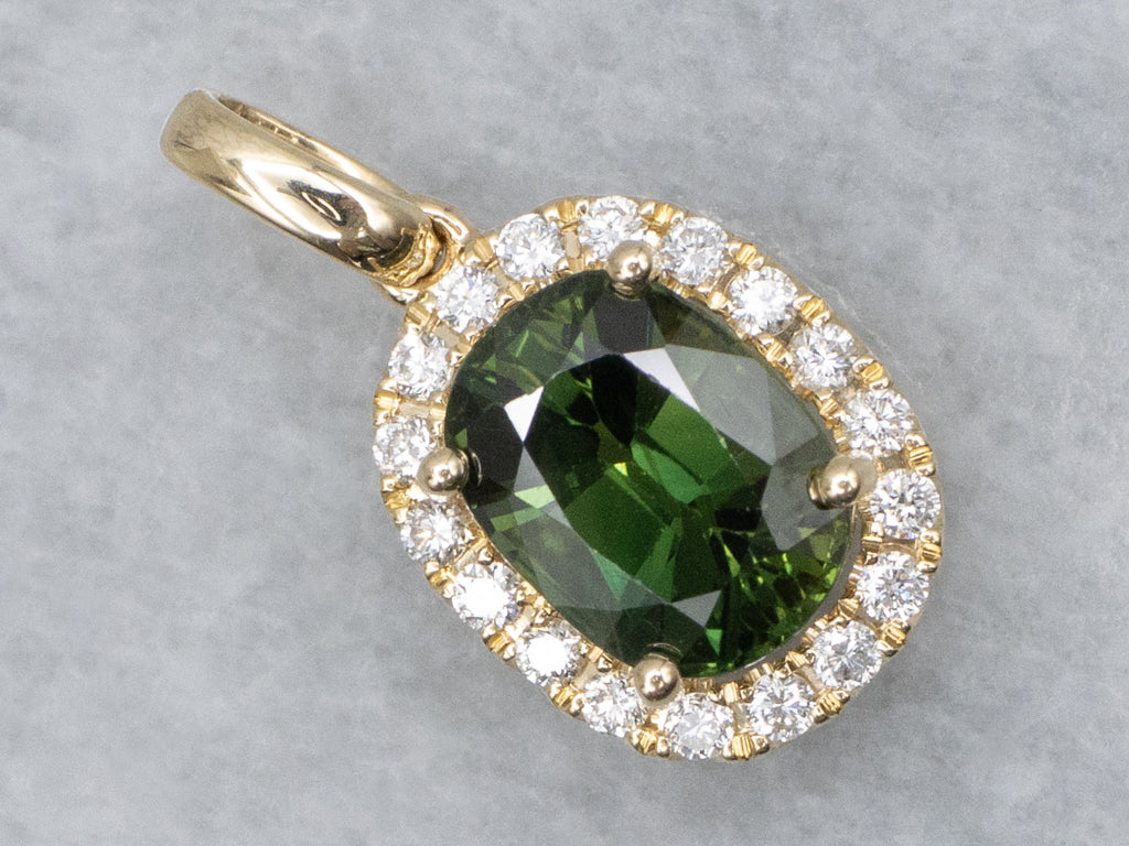 Modern Gold Green Sapphire and Diamond Halo Pendant