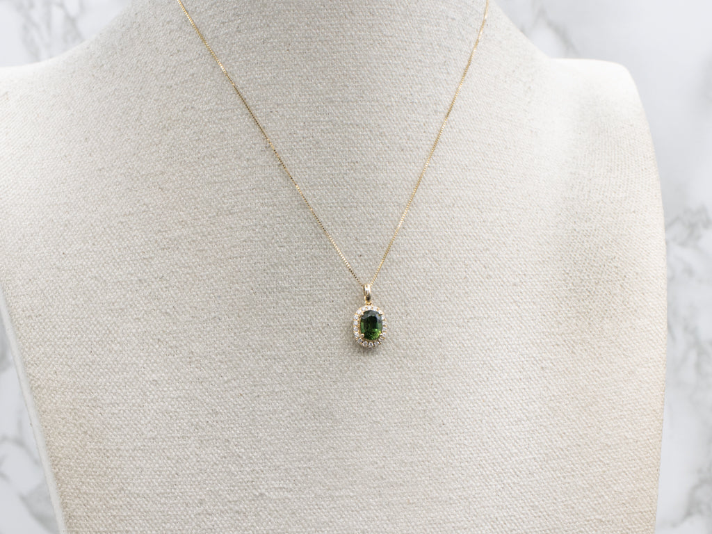 Modern Gold Green Sapphire and Diamond Halo Pendant