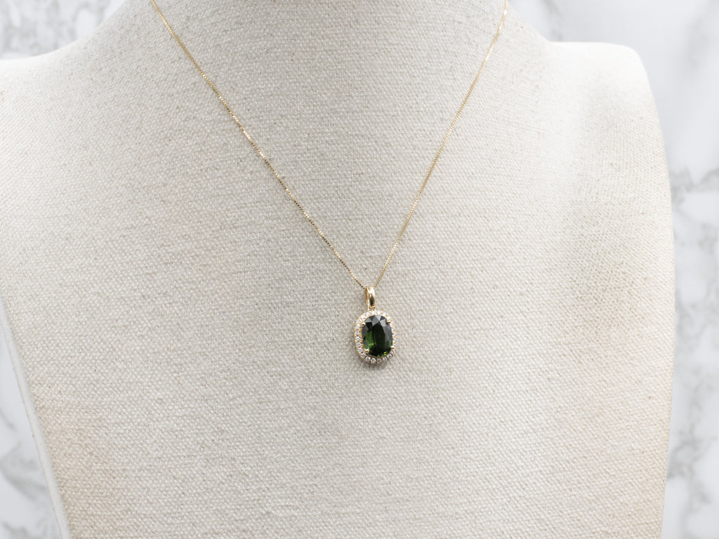 Modern Gold Green Sapphire and Diamond Halo Pendant
