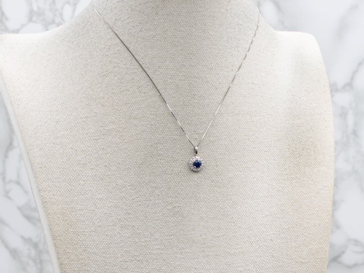 Modern White Gold Sapphire and Diamond Halo Pendant