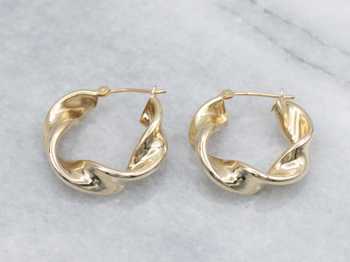 Twisted Yellow Gold Puffy Hoop Earrings