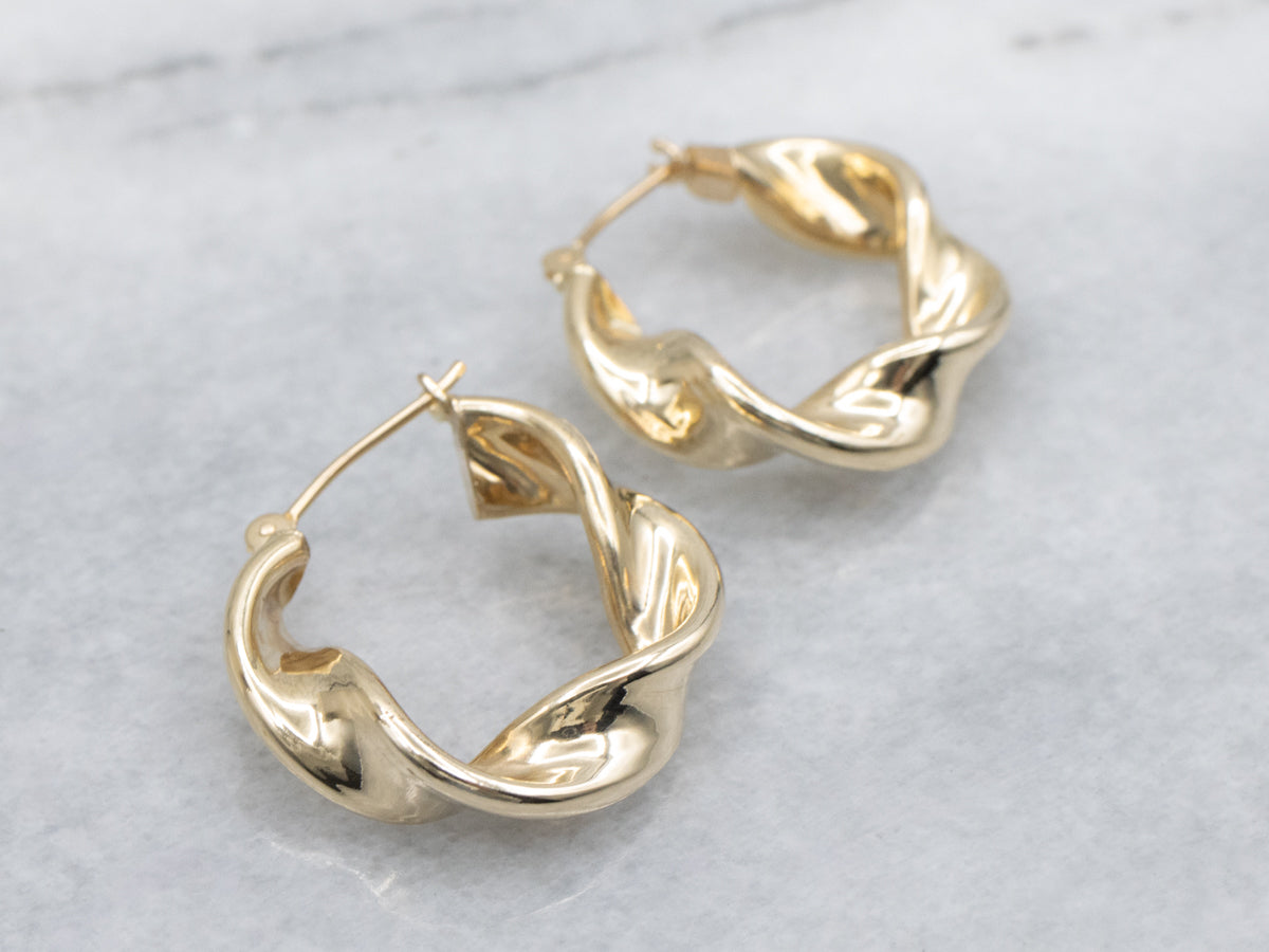 Twisted Yellow Gold Puffy Hoop Earrings