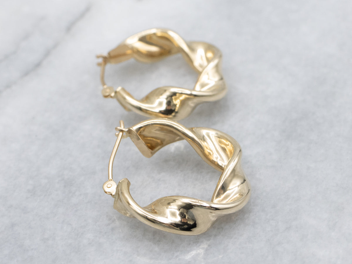 Twisted Yellow Gold Puffy Hoop Earrings