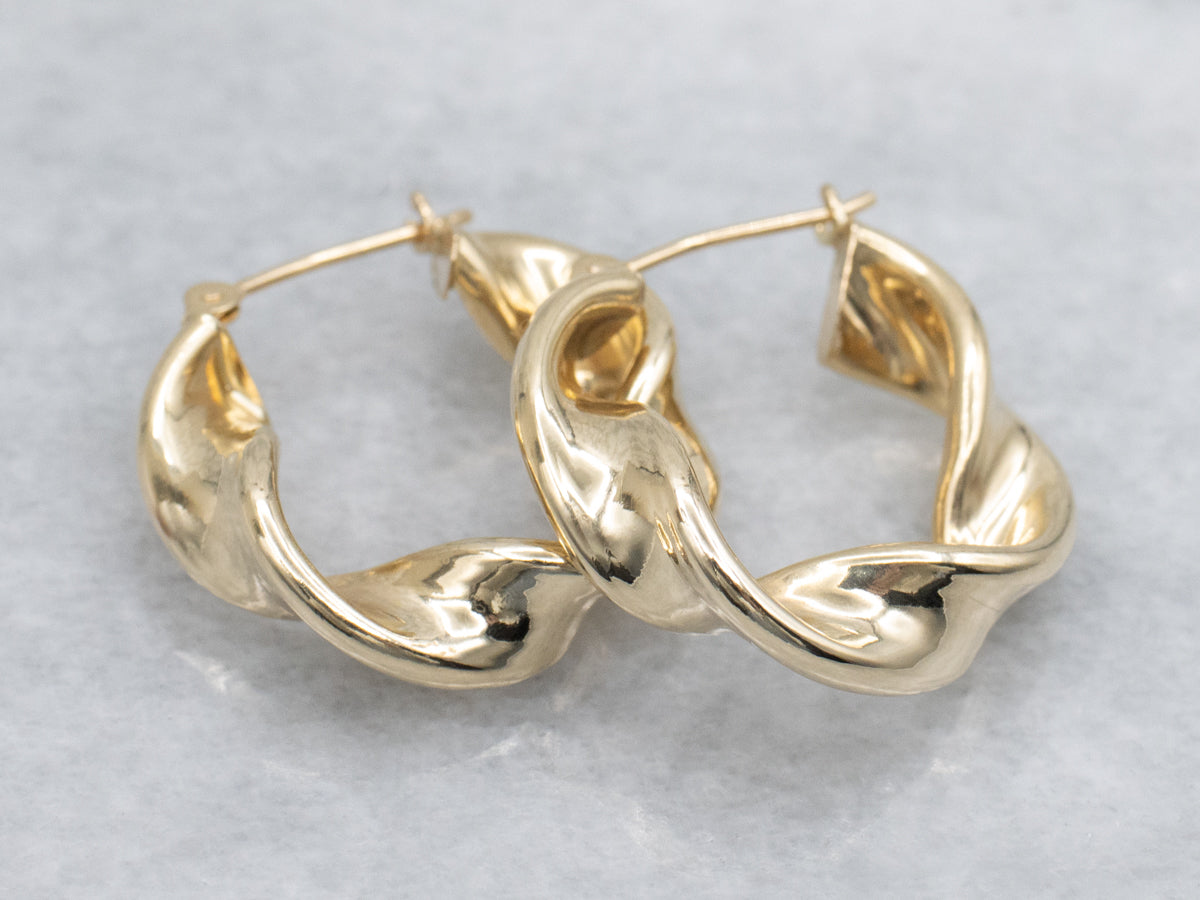 Twisted Yellow Gold Puffy Hoop Earrings