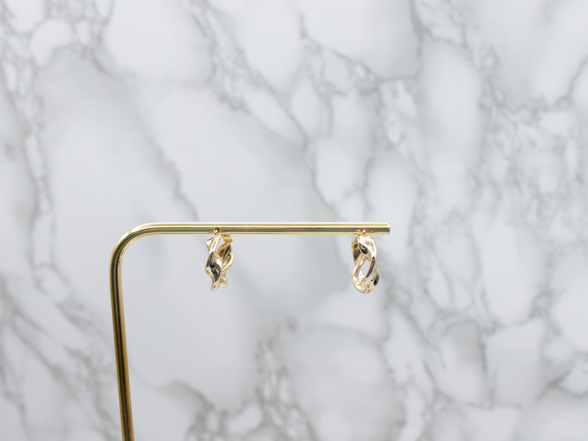 Twisted Yellow Gold Puffy Hoop Earrings