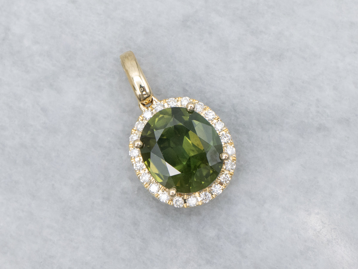 Modern Oval-Cut Green Sapphire and Diamond Halo Pendant