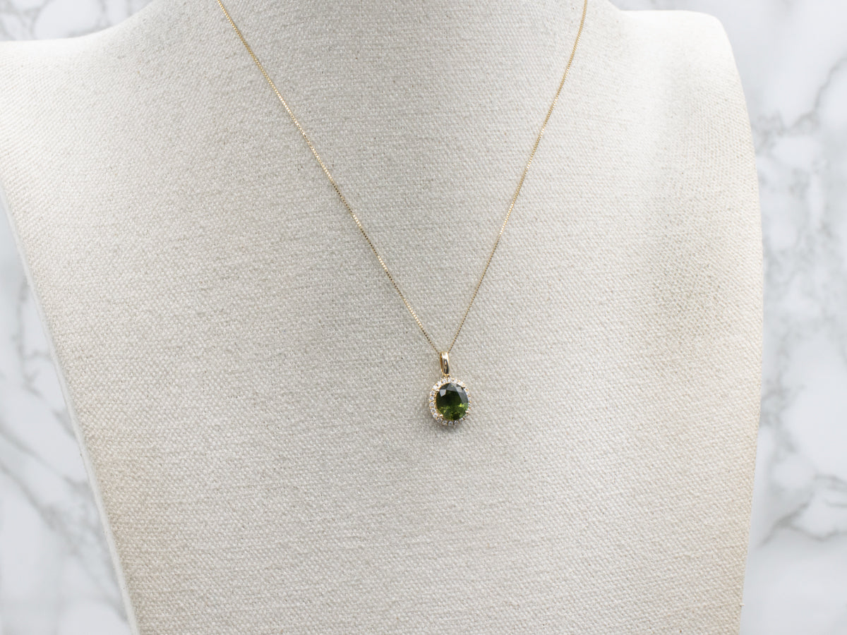 Modern Oval-Cut Green Sapphire and Diamond Halo Pendant
