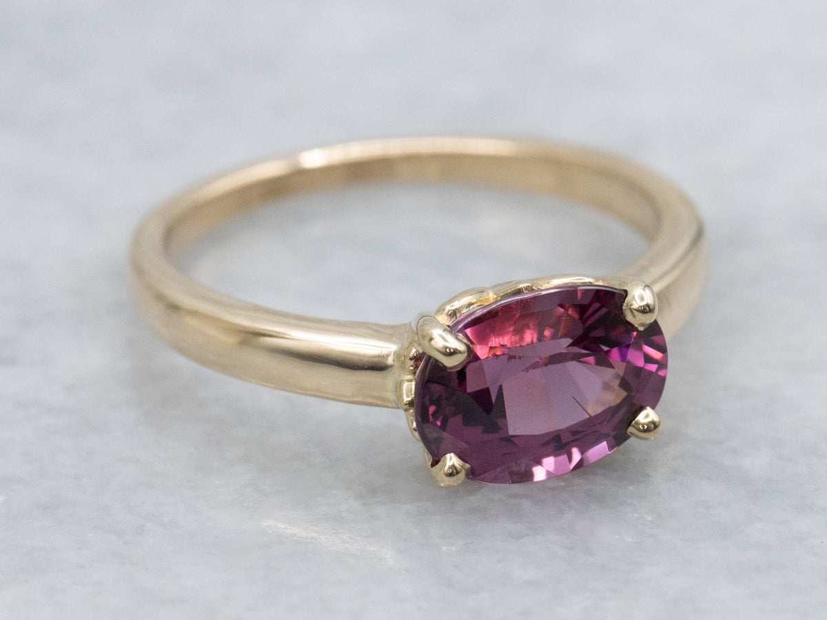 East to West Oval Cut Garnet Yellow Gold Solitaire Ring