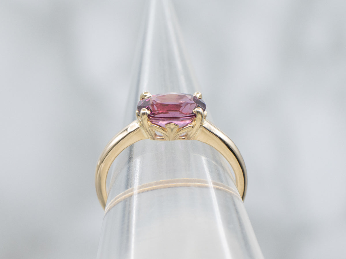 East to West Oval Cut Garnet Yellow Gold Solitaire Ring