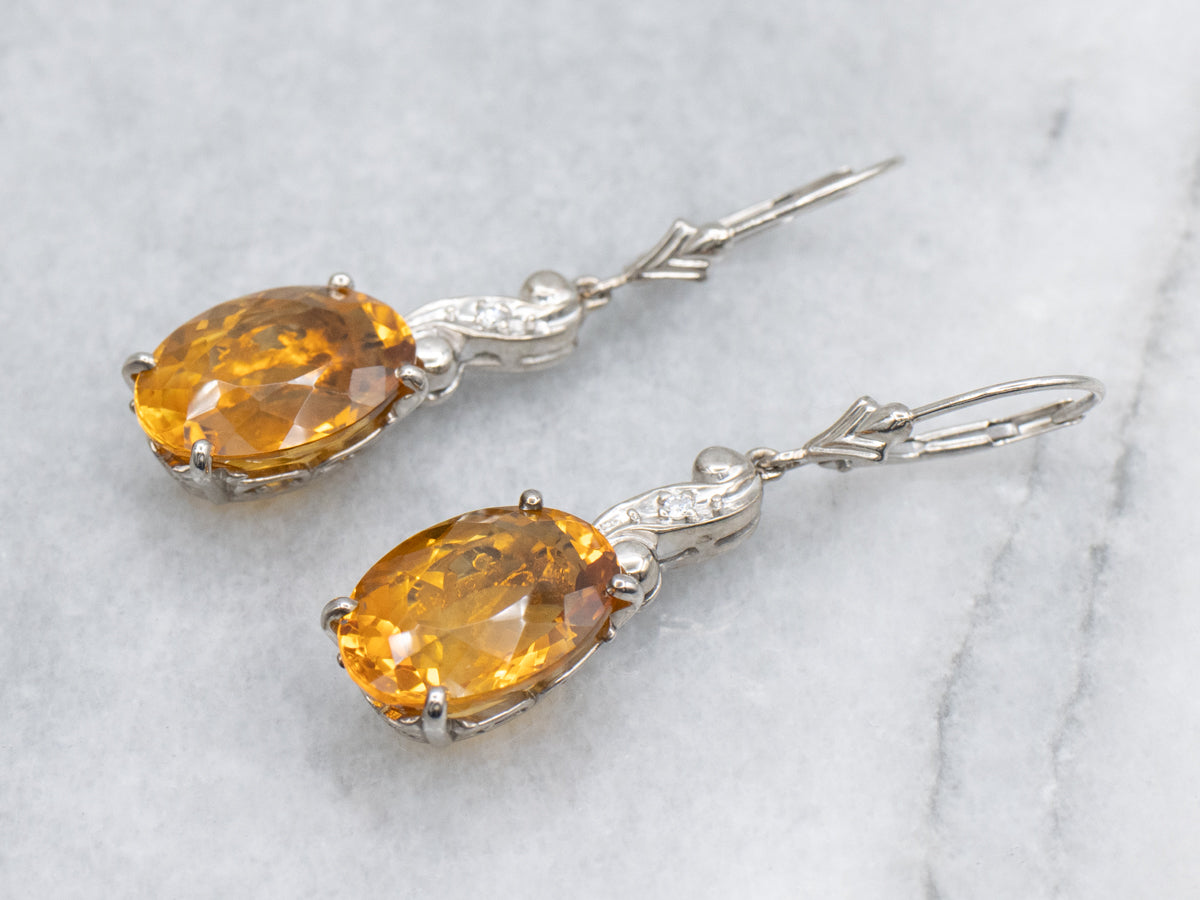 Oval Cut Citrine and Diamond Swirl White Gold Drop Earrings