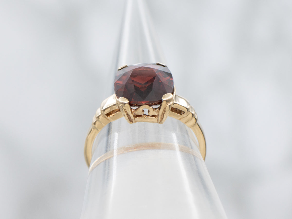 Cushion Cut Garnet in Vintage Yellow Gold Setting