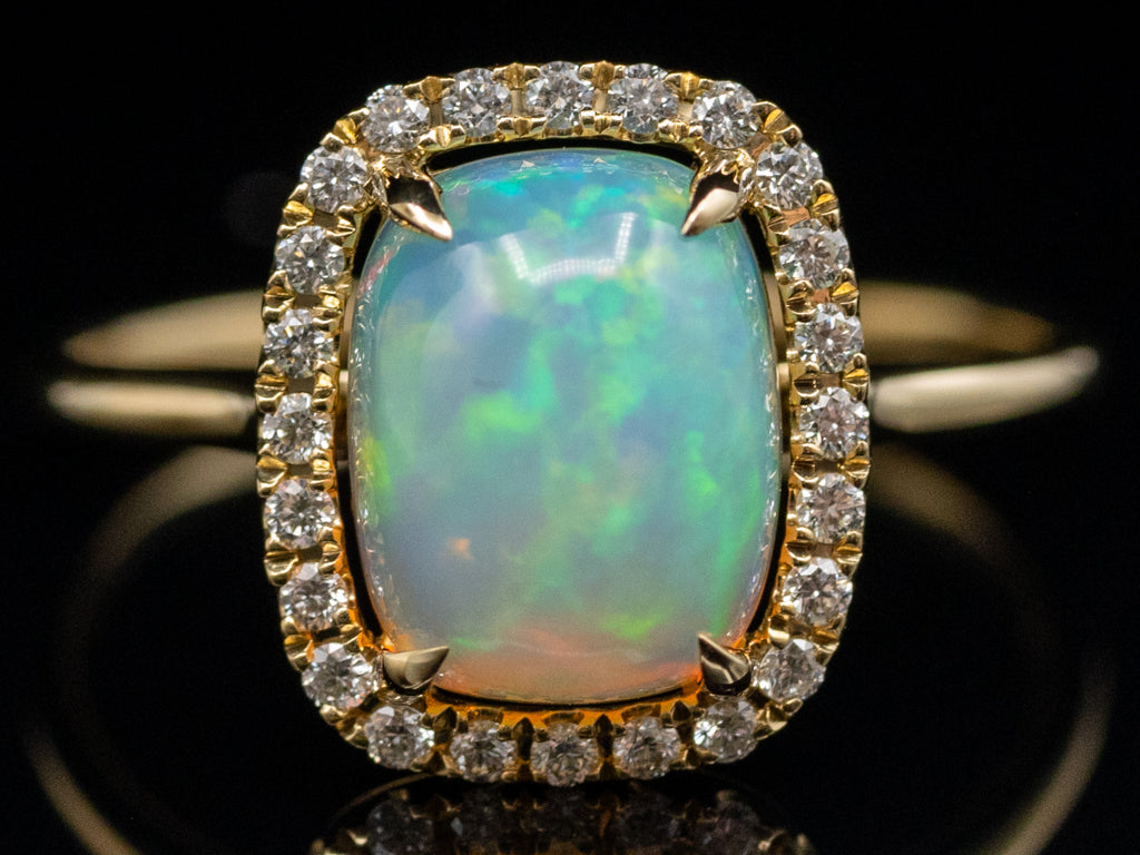 Modern Cushion-Cut Opal and Diamond Halo Ring