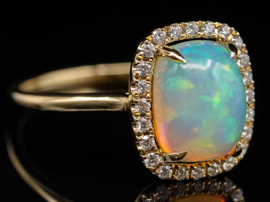 Modern Cushion-Cut Opal and Diamond Halo Ring