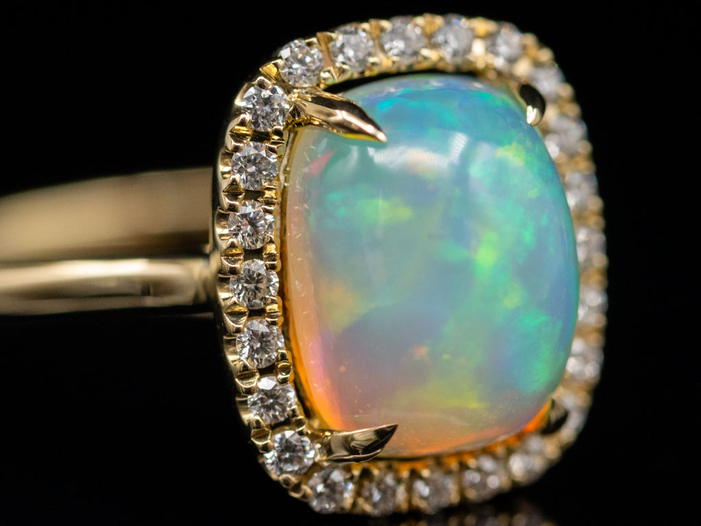 Modern Cushion-Cut Opal and Diamond Halo Ring