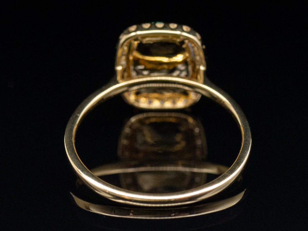 Modern Cushion-Cut Opal and Diamond Halo Ring
