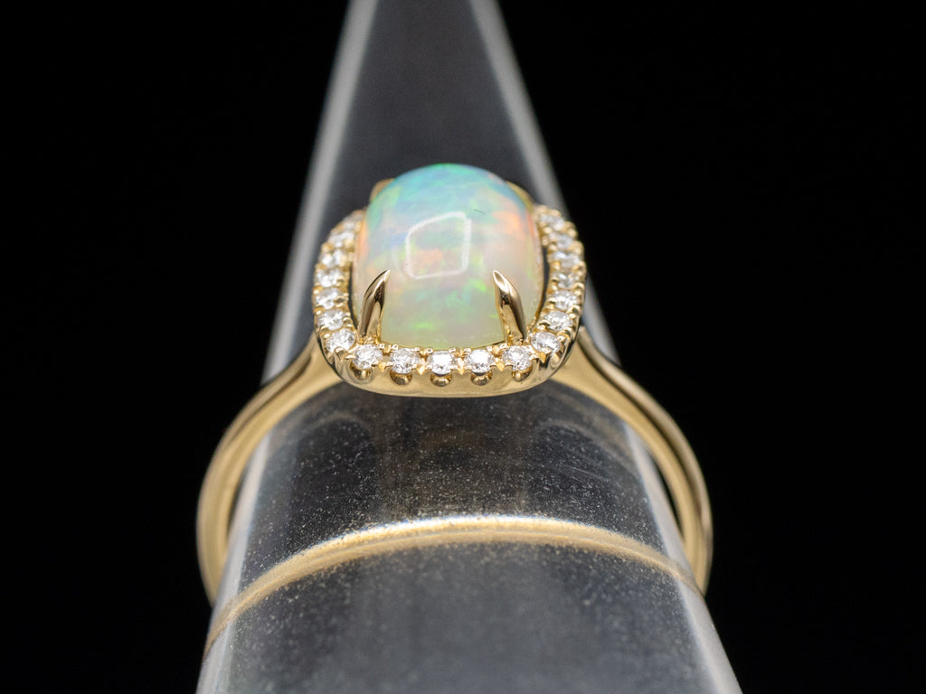 Modern Cushion-Cut Opal and Diamond Halo Ring