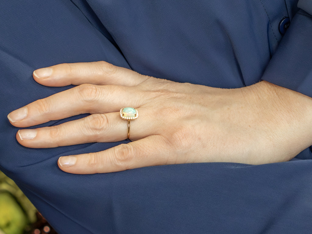 Modern Cushion-Cut Opal and Diamond Halo Ring