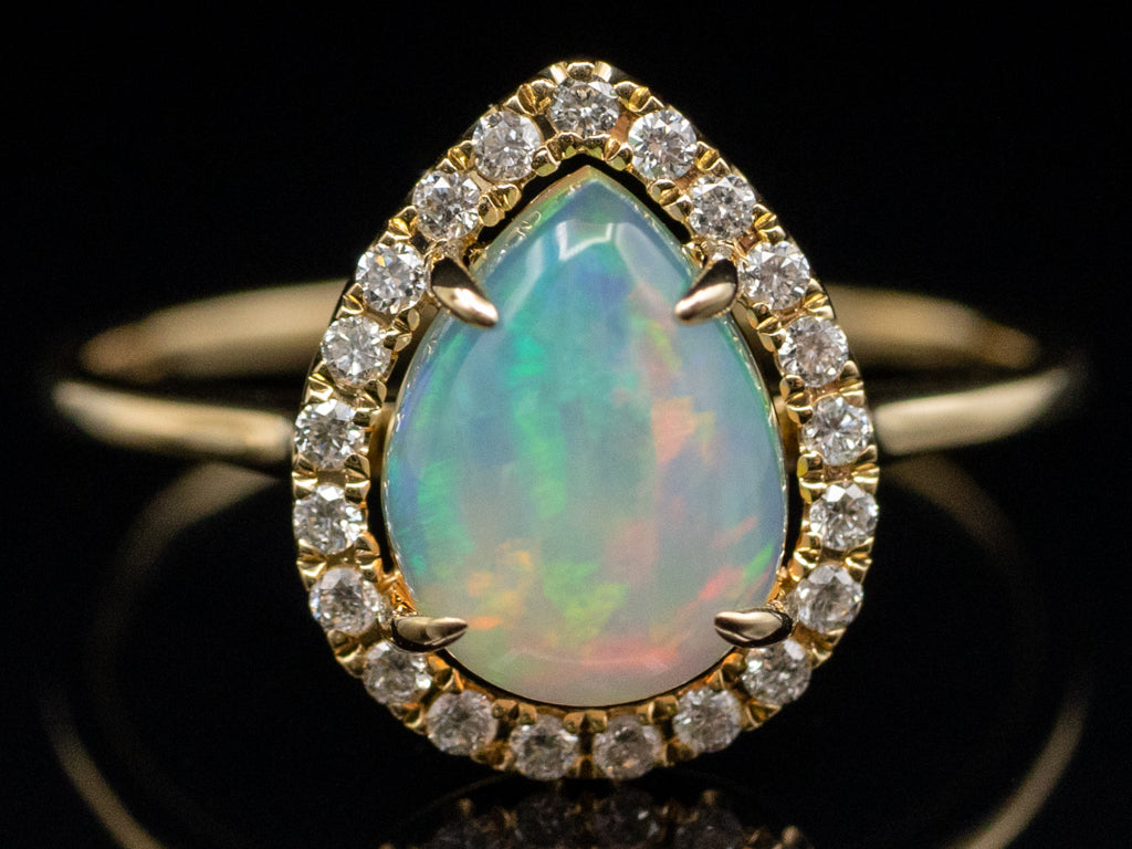 Modern Pear-Cut Opal and Diamond Halo Yellow Gold Ring