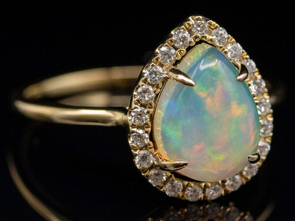 Modern Pear-Cut Opal and Diamond Halo Yellow Gold Ring