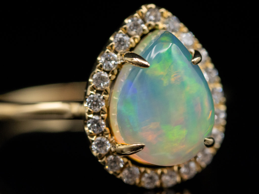 Modern Pear-Cut Opal and Diamond Halo Yellow Gold Ring