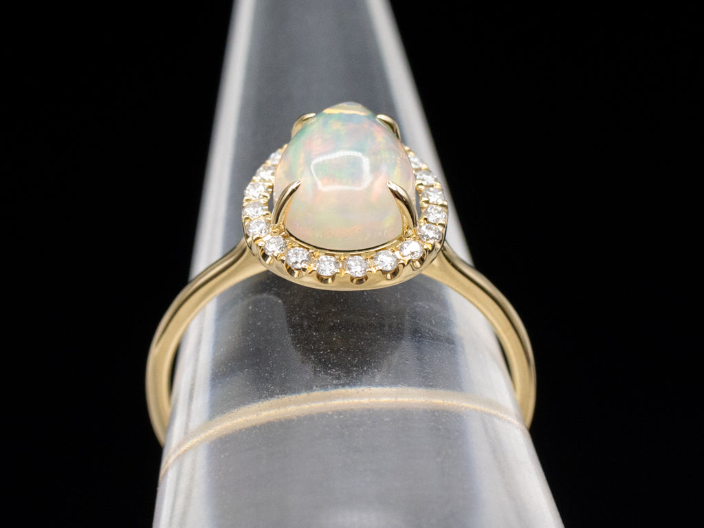 Modern Pear-Cut Opal and Diamond Halo Yellow Gold Ring