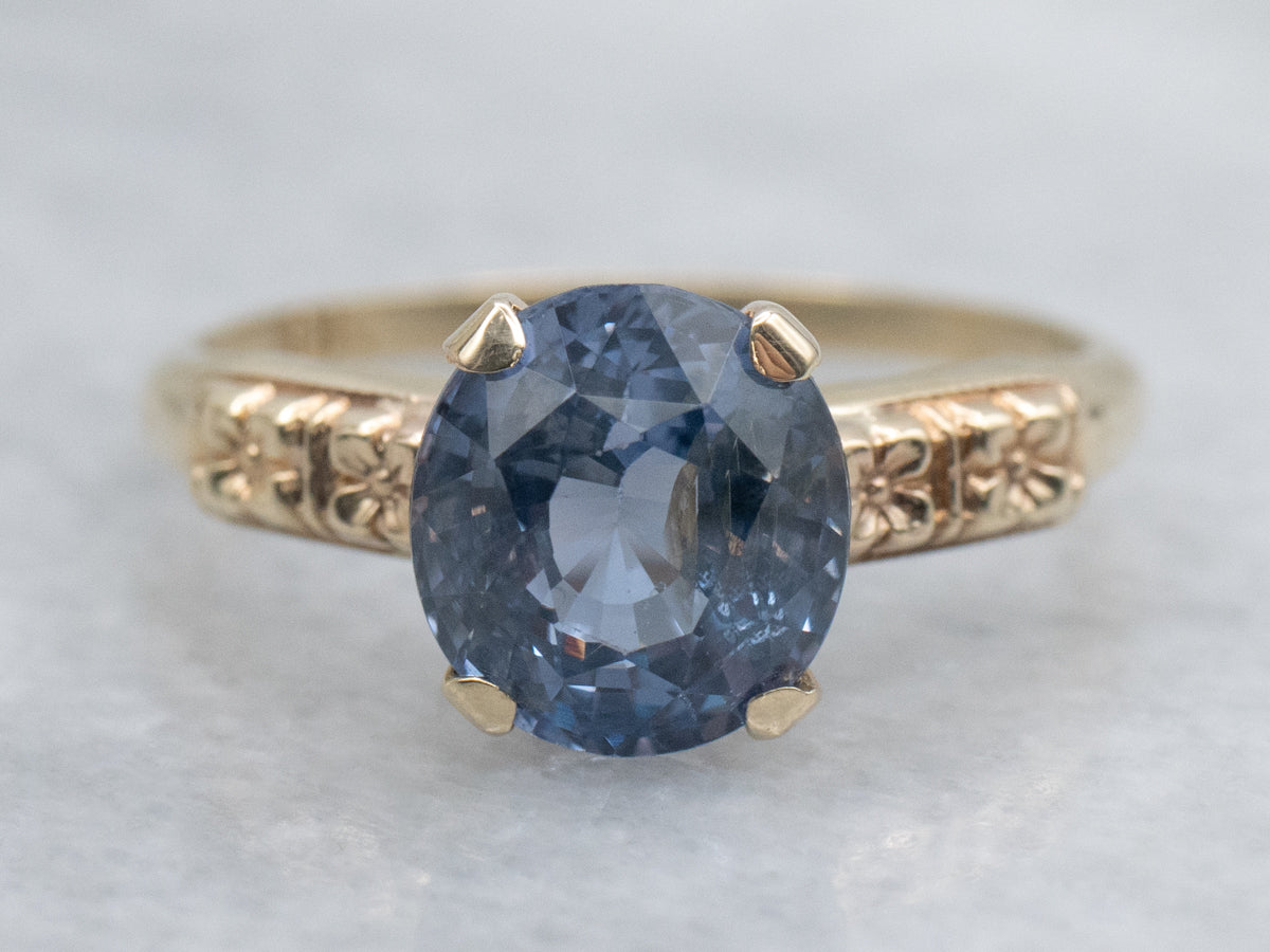 Indigo-Hued Spinel in Vintage Gold Floral Solitaire Setting
