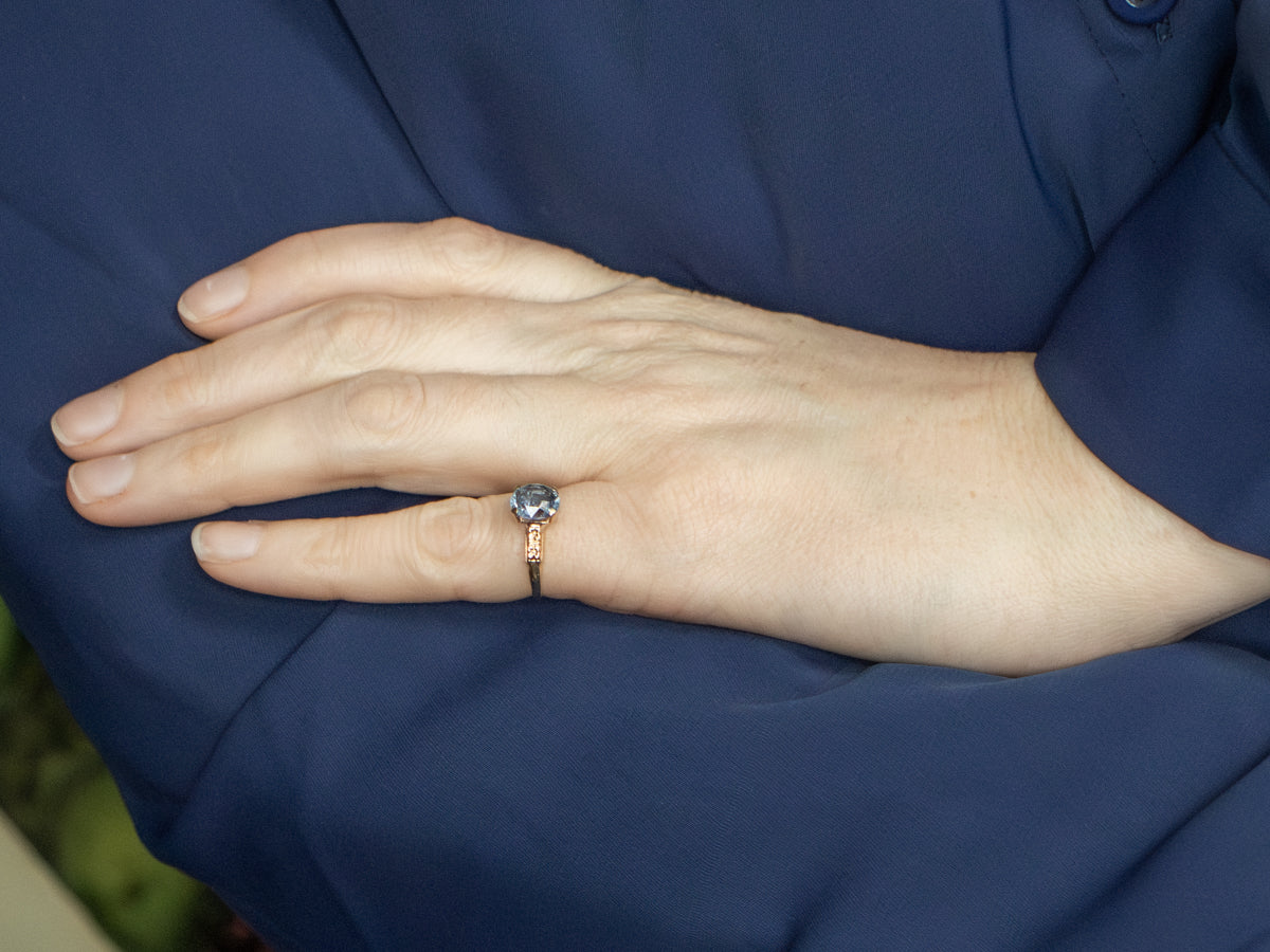 Indigo-Hued Spinel in Vintage Gold Floral Solitaire Setting