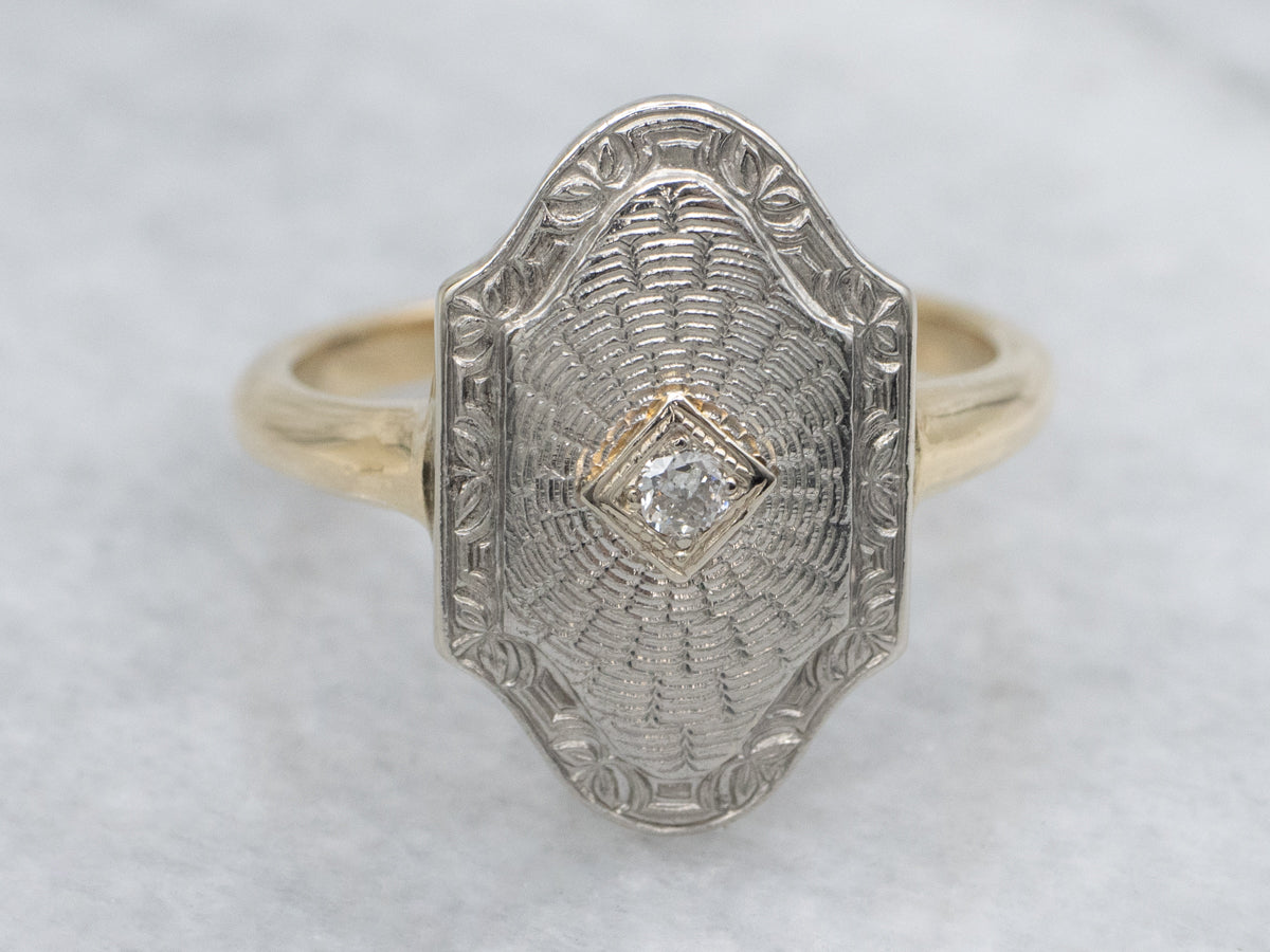 Vintage Diamond Solitaire Ring with Engraved Patterns