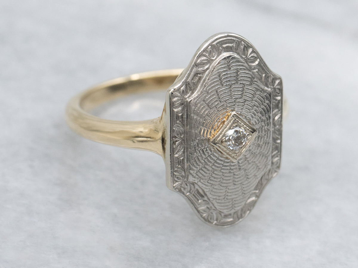 Vintage Diamond Solitaire Ring with Engraved Patterns