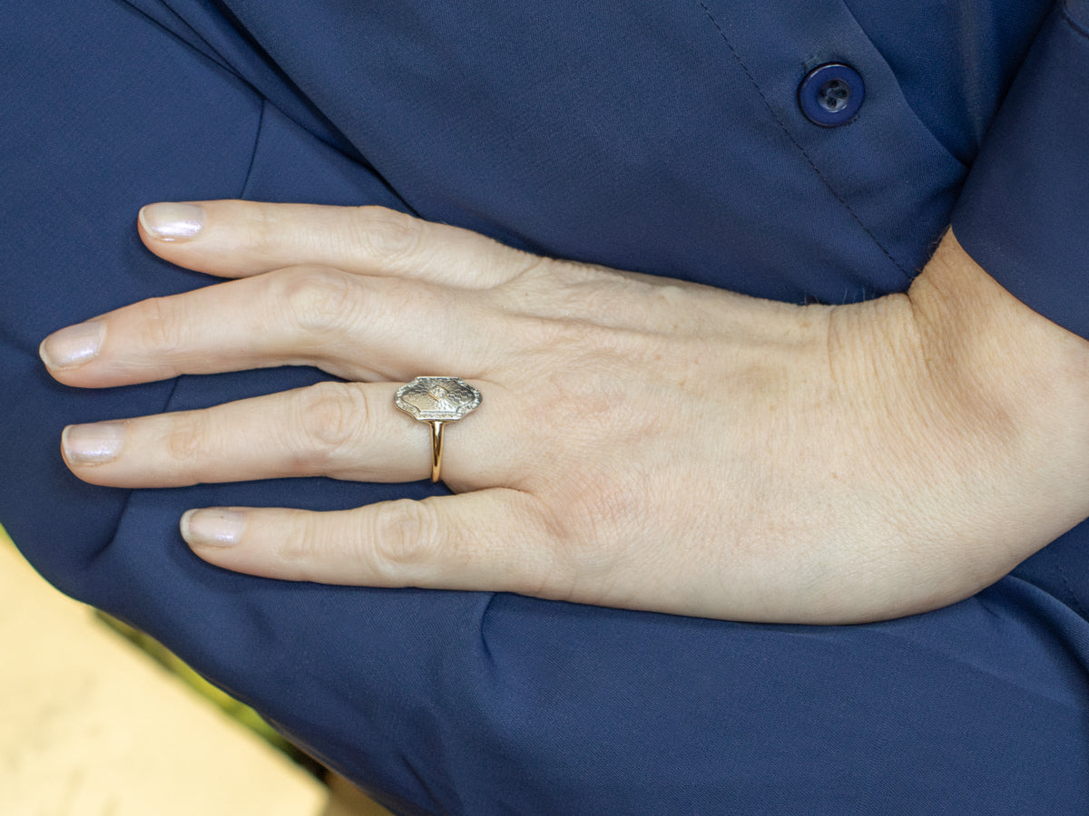 Vintage Diamond Solitaire Ring with Engraved Patterns