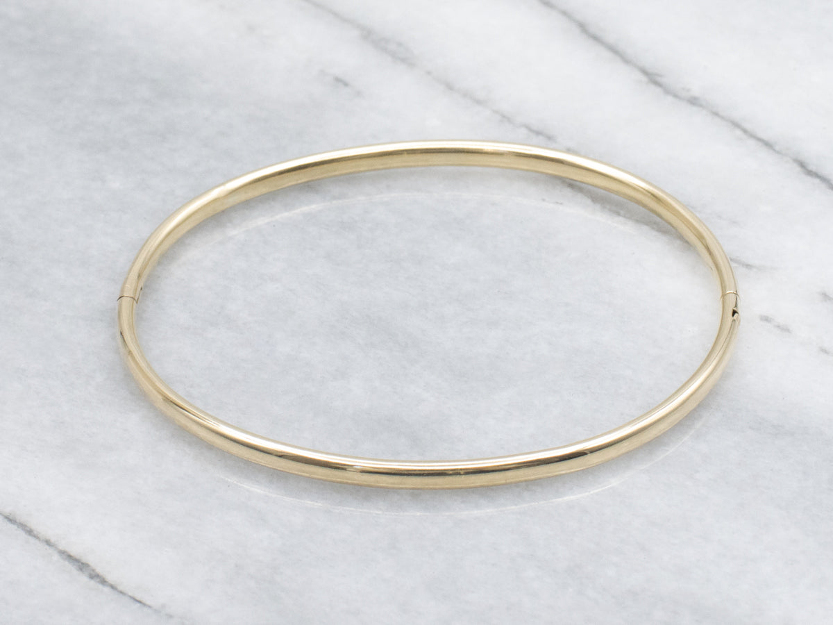 Sleek Polished Yellow Gold Hinged Bangle Bracelet