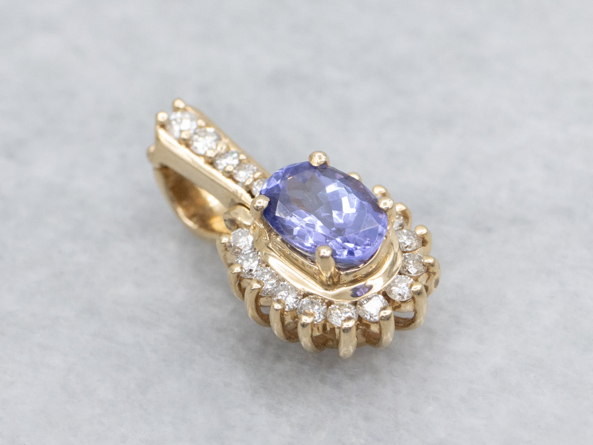 Modern Tanzanite and Diamond Halo Pendant