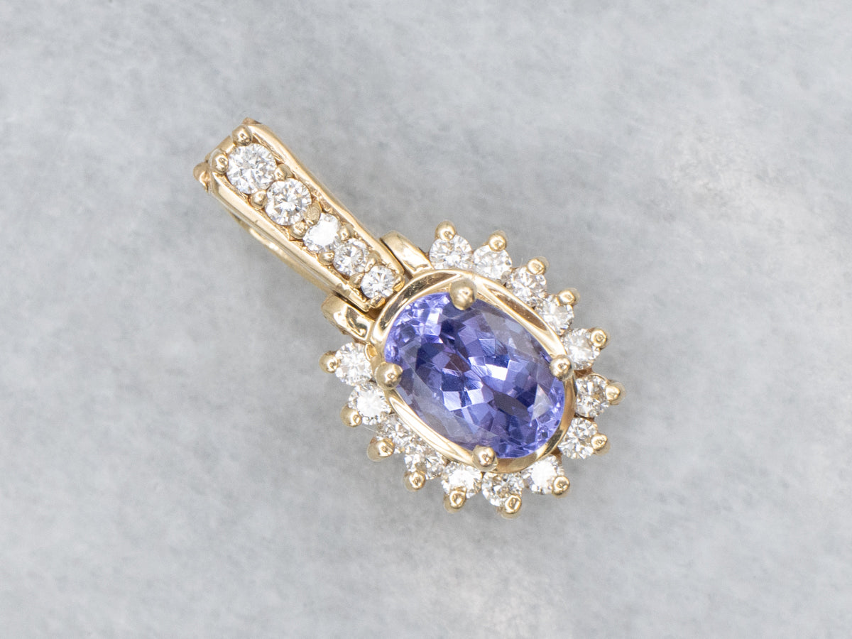 Modern Tanzanite and Diamond Halo Pendant