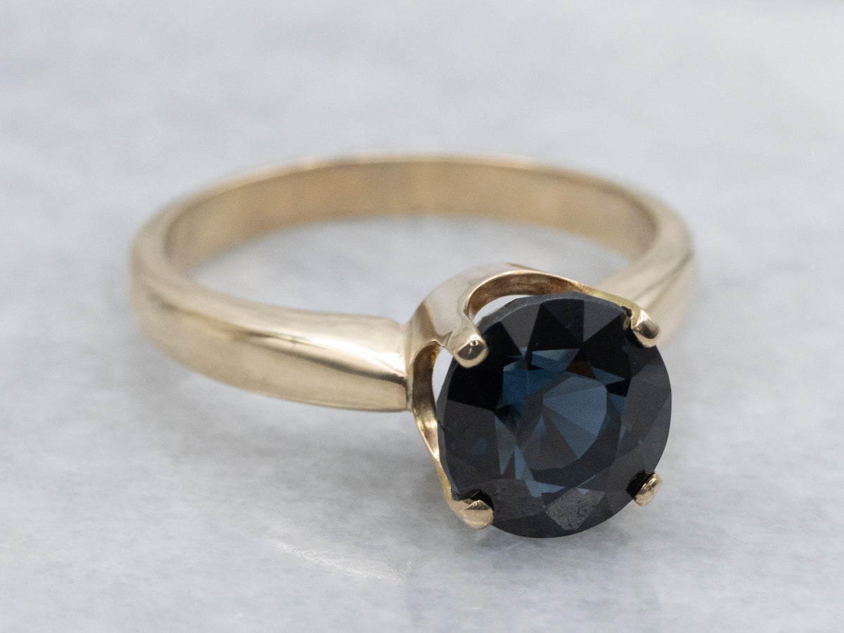 Deep Blue Spinel Solitaire Ring in Yellow Gold