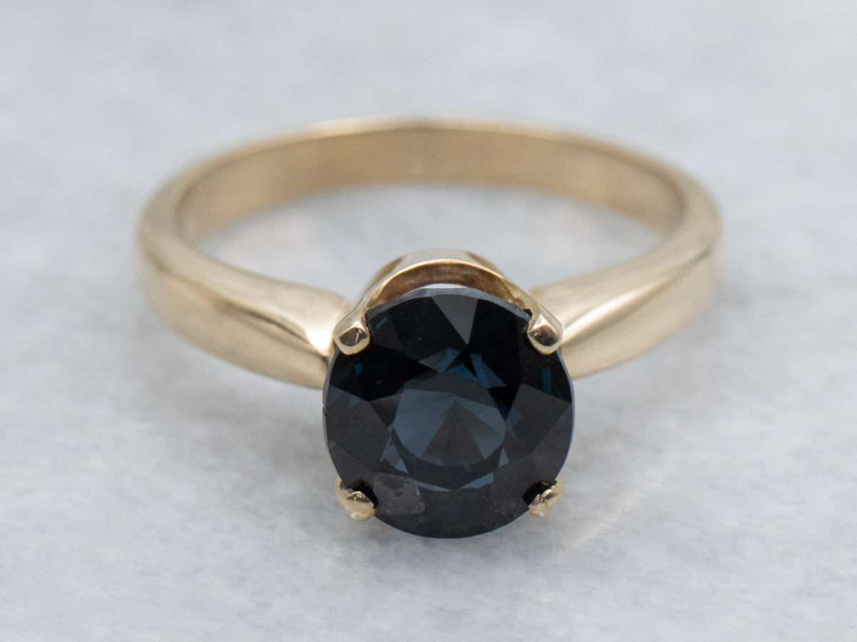 Deep Blue Spinel Solitaire Ring in Yellow Gold