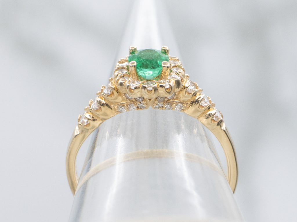 Modern Yellow Gold Emerald and Diamond Halo Ring