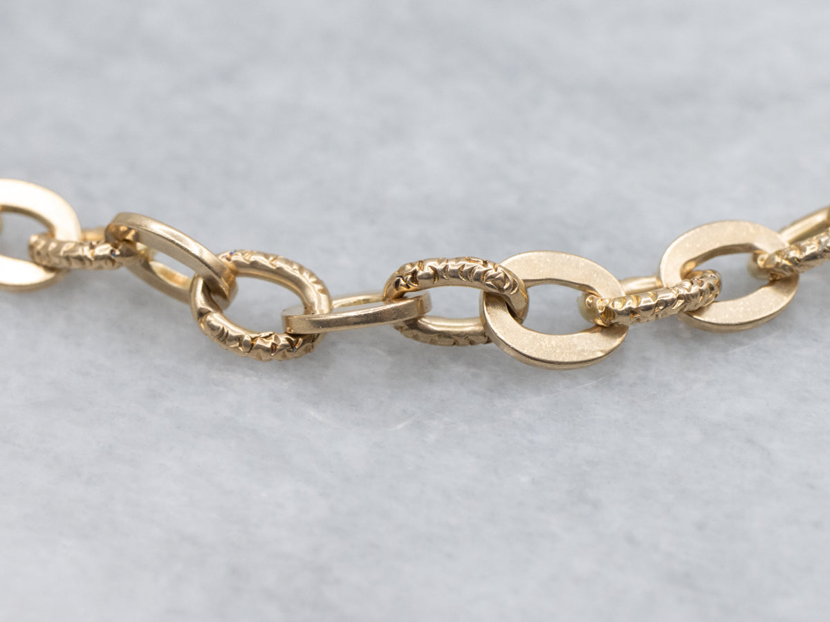 Flat and Textured Gold Oval-Link Bracelet